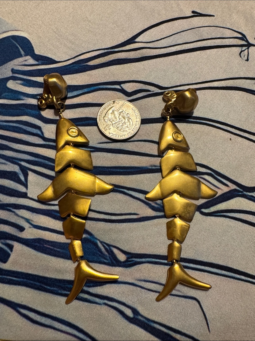 Anne Klein Gold Fishbone Dangle Clip-On Earrings - Articulated Metallic Drop